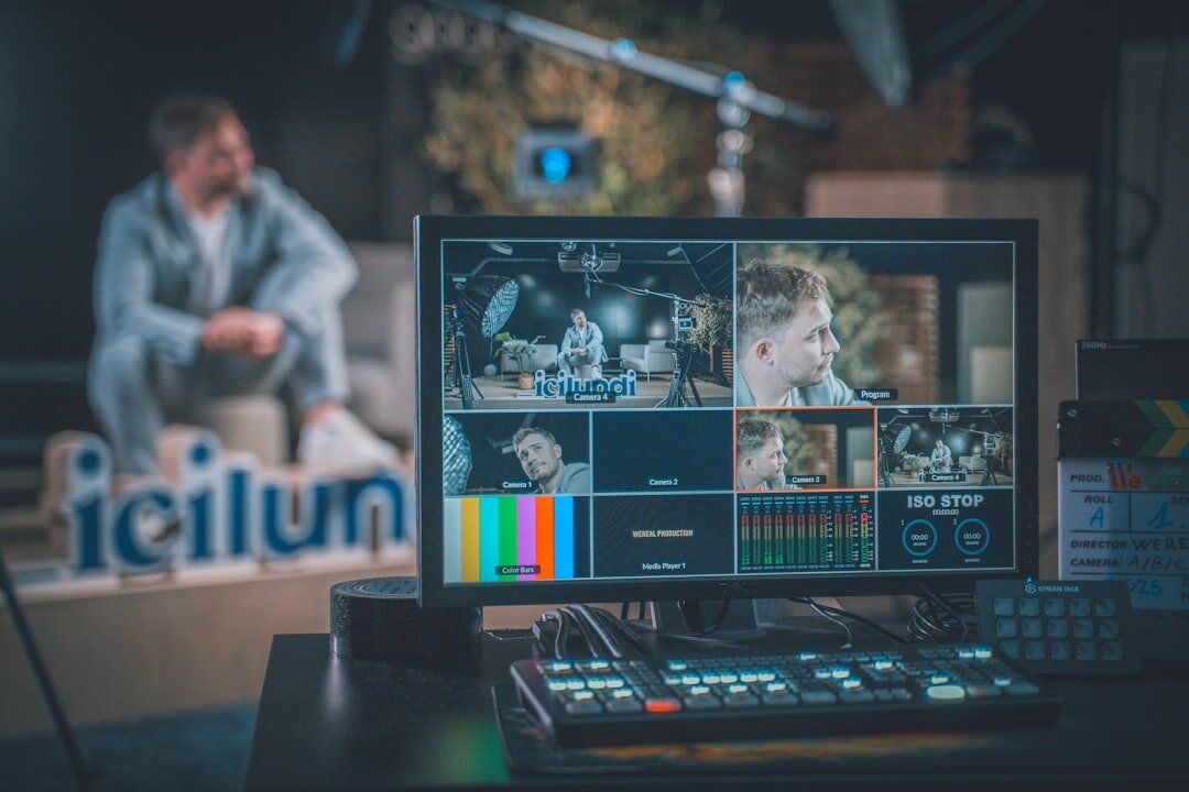 Wide view of a television studio with cameras and lighting rigs during a live show