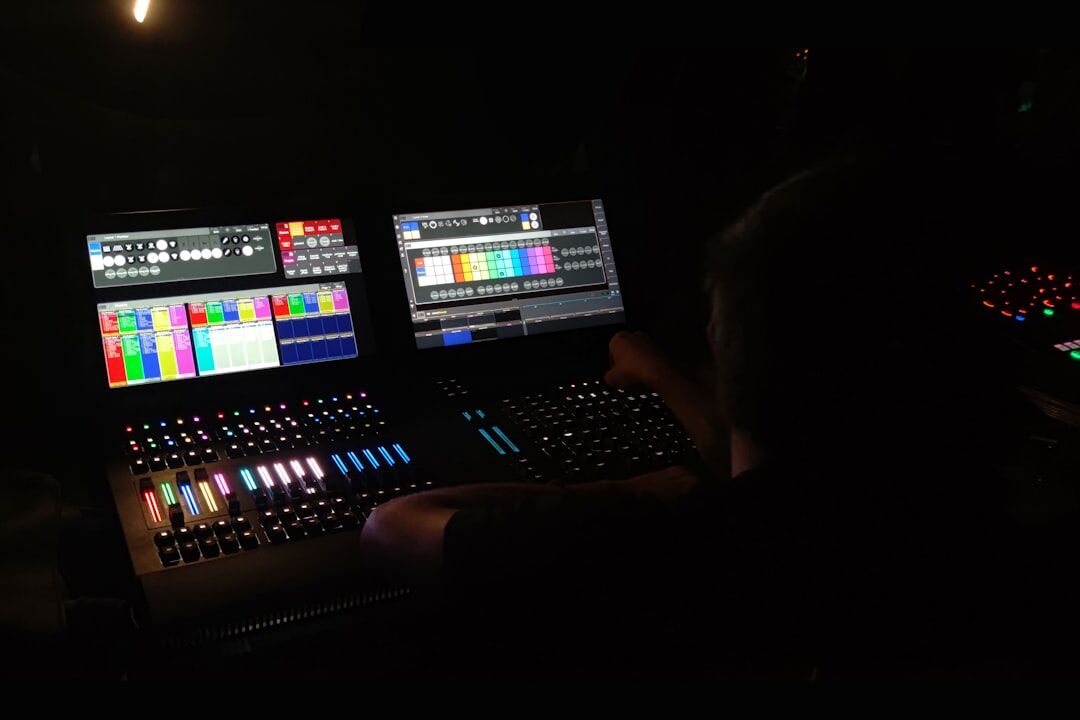 Television broadcast control room with multiple monitors showing live camera feeds